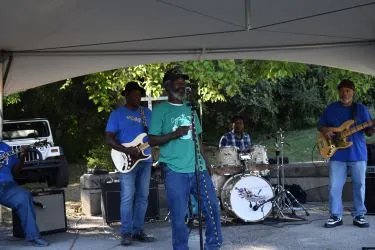 a band of men performing at the North Fairmount FYI community outreach event in 2023