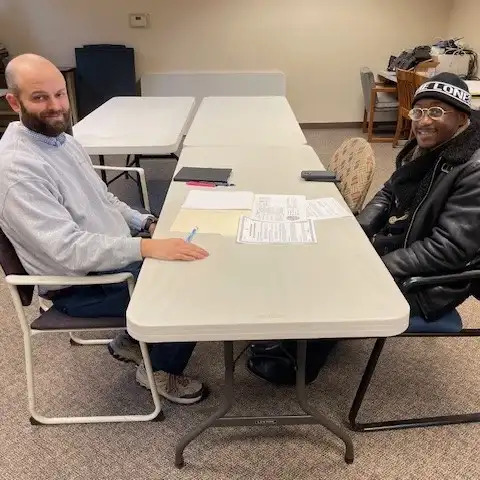 Devoe Sherman sits with Housing Counselor Jeff Smith for one-on-one HUD-certified housing counseling.
